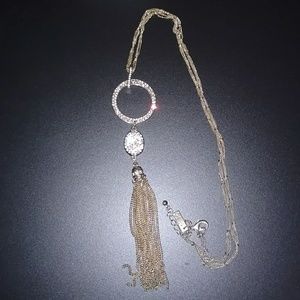 INC gold long necklace with a tassel